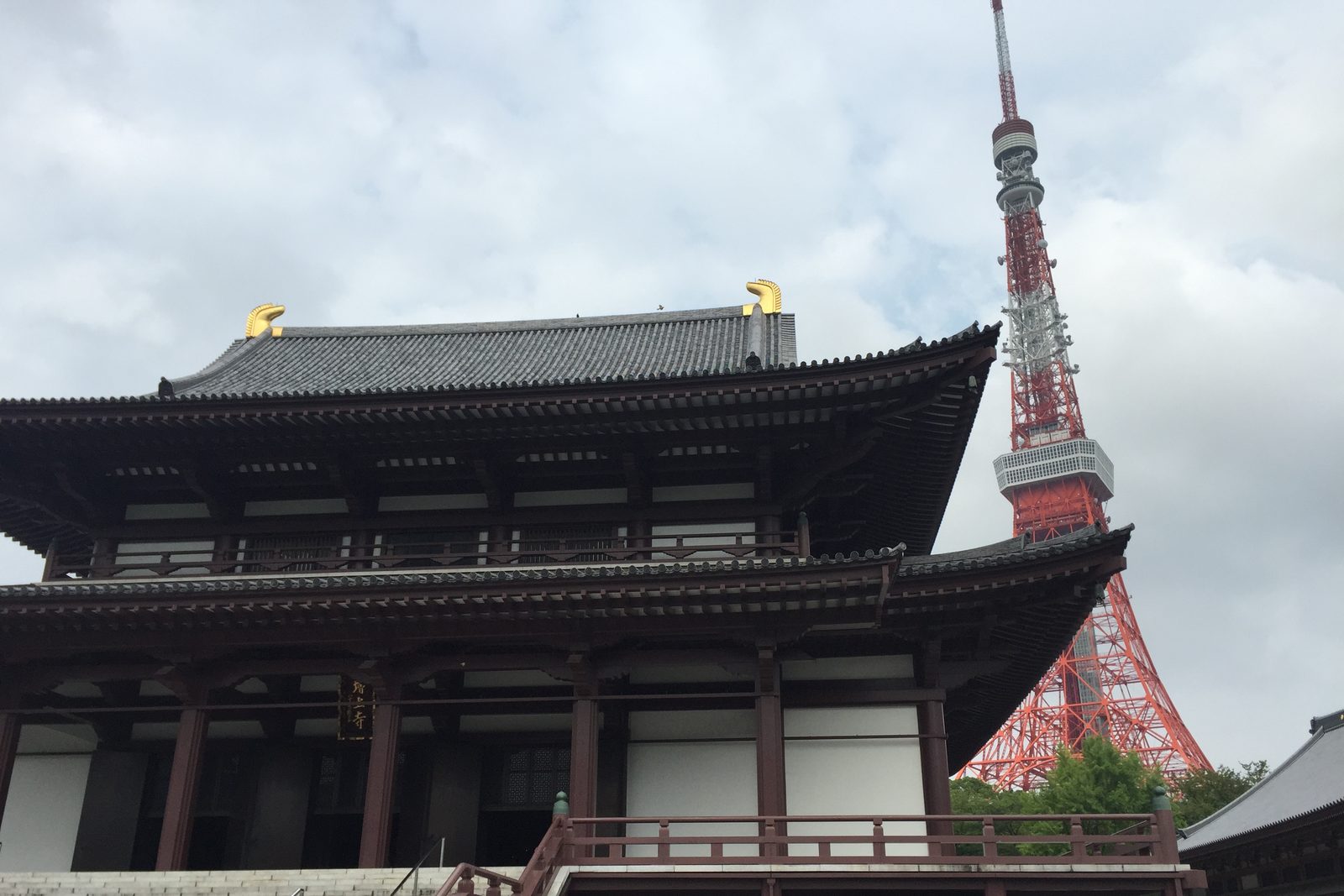 Zojoji Temple's main hall with Tokyo Tower behind it, Tokyo